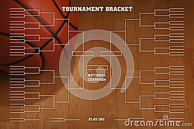 Basketball tournament bracket with spot lighting on wood gym flo Stock Photo