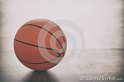 Basketball on wooden floor Stock Photo