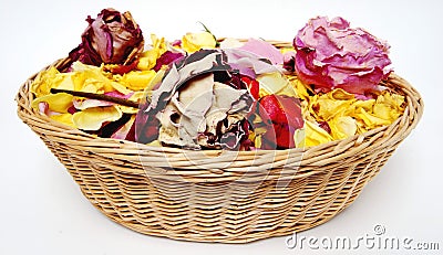 Basketful of petal roses Stock Photo
