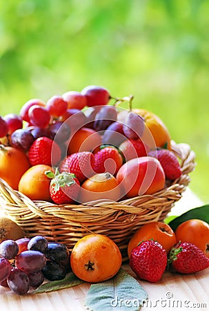 Basketful of ripe fruits Stock Photo