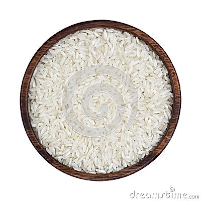 Basmati rice groats in wooden bowl isolated on white background. Top view Stock Photo