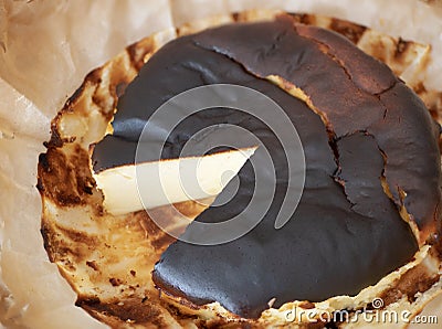 Basque burnt cheesecake with a rich, dark caramelized exterior surface and jiggly middle Stock Photo