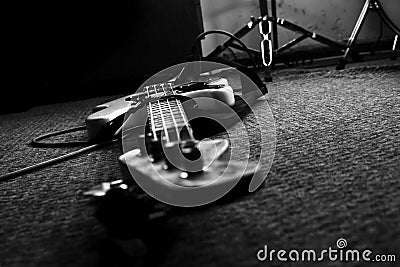 Bass Guitar In Music Studio. Musical Instruments and Equipment Stock Photo