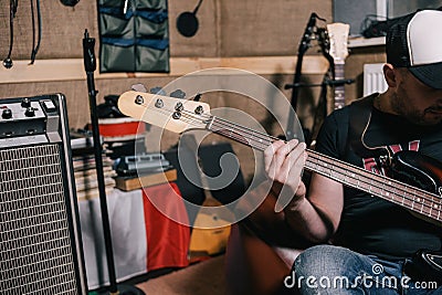 Bass guitar riff in music studio closeup Stock Photo