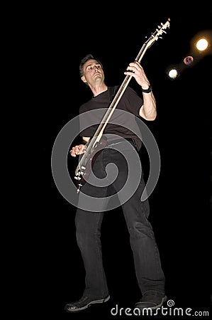 Bass guitarist playing Stock Photo