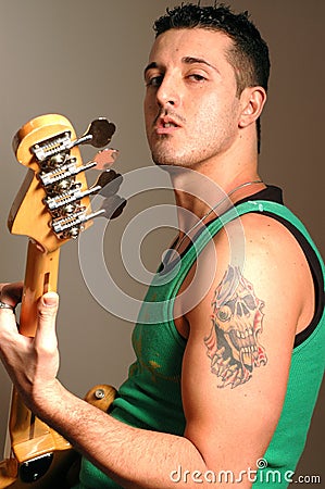 Bass Player With Tattoo Stock Photography - Image: 488872
