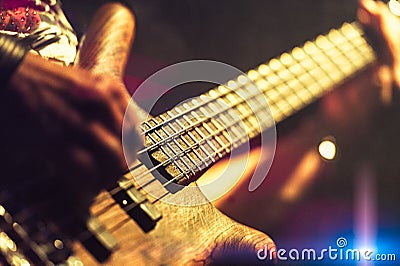 Bassist pop rock during a performance at a concert Stock Photo