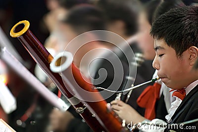 Bassoon boy Stock Photo