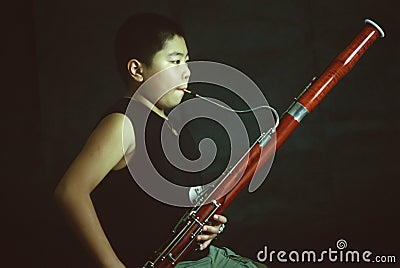 A bassoon boy Stock Photo