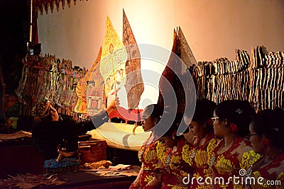 Dhalang / Dalang` The puppeteer in Indonesia Wayang performance Editorial Stock Photo