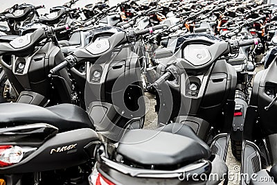 A batch of new Motorbikes parked at a dealership lot. Editorial Stock Photo
