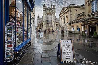 Bath Abbey on a wet day with cloudy blue sky in Bath, Somerset, UK Editorial Stock Photo