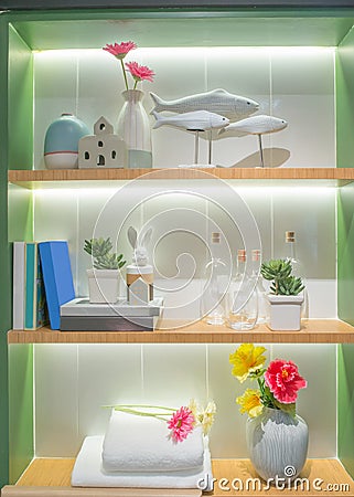 Bath accessories on shelfs in bathroom Stock Photo