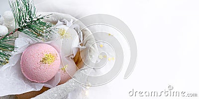 Bath balls in basket with fir branch. Spa aromatherapy concept. Stock Photo