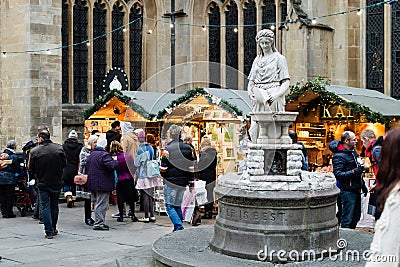 Bath Christmas Market - Statue of Water Goddess outside Bath Abbey Editorial Stock Photo