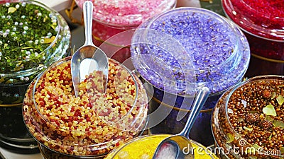 Bath salts soaks closeup bathsalt in various scents in jars at shop store Stock Photo