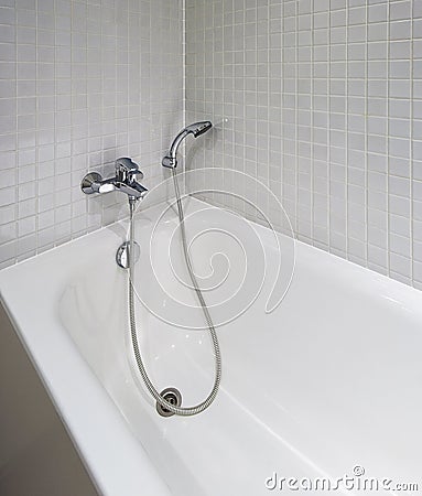 Bath tub with shower attachment Stock Photo