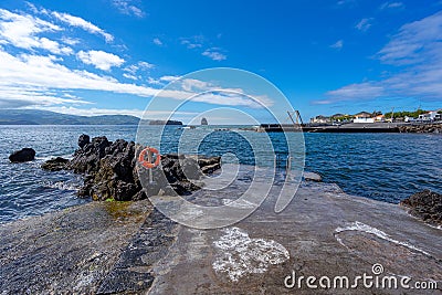 bathing area with round lifebuoy. Pico island in the Azores archipelago. Stock Photo