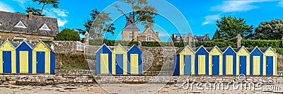 Bathing huts on the beach Stock Photo