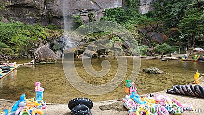 Bathing pool right under the Sarasah Bunta Waterfall Editorial Stock Photo