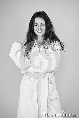 This bathrobe suits her natural beauty. Sensual woman after beauty treatment and wellness therapy. Pretty young woman Stock Photo