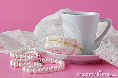 Bathroom counter with coffee, vintage pearls jewelry Stock Photo