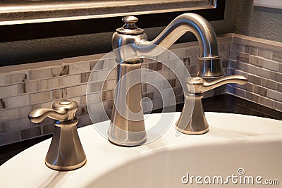 Bathroom faucet Stock Photo