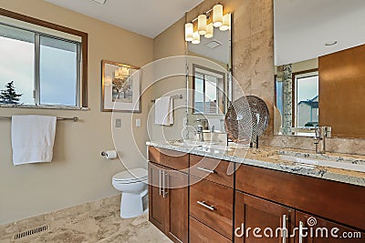 Bathroom with large vanity, mirror and granite countertop Stock Photo