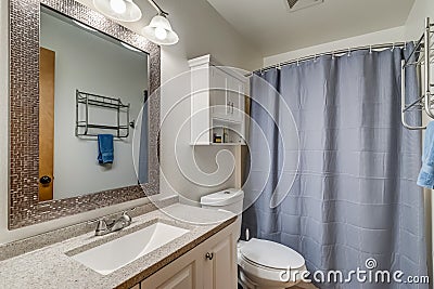 Bathroom remodel nice cabinet shower curtain blue vanity Stock Photo