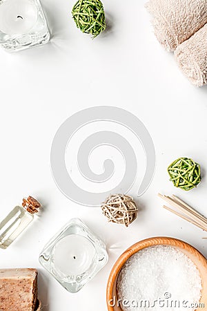 Bathroom salt and aroma oil for spa on white background top view mock-up Stock Photo