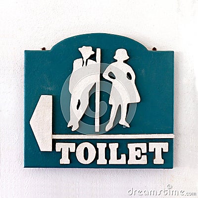 Bathroom sign, Public sign toilet male-female old vintage style on the wall of white cement, Toilet sign Stock Photo
