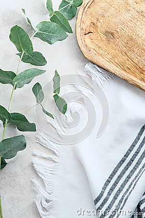 Bathroom stone table with eucalyptus branches, wooden board, towel. Cosmetic product placement concept Stock Photo