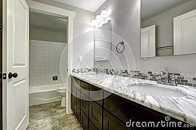 Bathroom vanity cabinet with white granite top Stock Photo