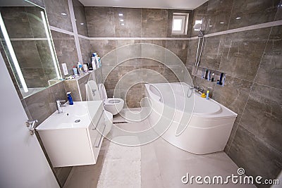 Bathroom wide in modern nice house with light Stock Photo