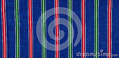 Batiste fabric texture. striped coloring, red green blue white s Stock Photo