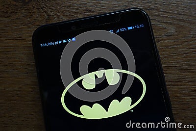 Batman logo displayed on a modern smartphone Editorial Stock Photo