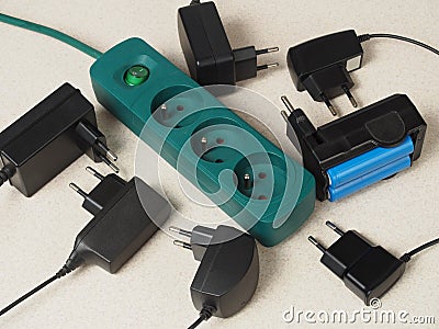 Battery chargers and extension cord Stock Photo