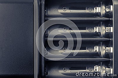 Battery compartment close-up. Battery charger. Stock Photo