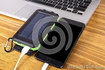 Battery Power Bank Charging A Cell Phone Stock Photo