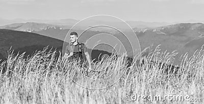 Battle field. man ready to fire. hunter hobby. army forces. sniper reach target mountain. muscular man hold weapon Stock Photo