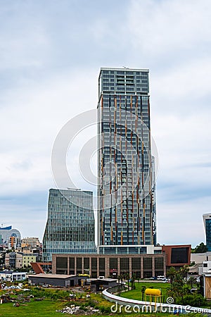 Batumi, Georgia - August 13 2021: view of downtown with Porta Batumi Tower. Construction, tall buildings, glass, metal and Editorial Stock Photo