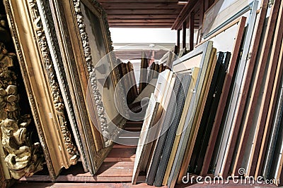 Wooden shelves at art gallery storage full of pictures Editorial Stock Photo