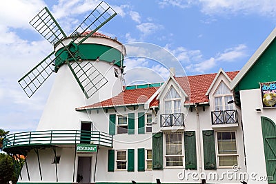 Dutch house with windmill. The well-known restaurant in the Dutch style Editorial Stock Photo