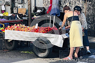 BATUMI, GEORGIA - JULY 01, 2023: Sale of cherries, fruits, vegetables, and other products at the street market in Batumi Editorial Stock Photo