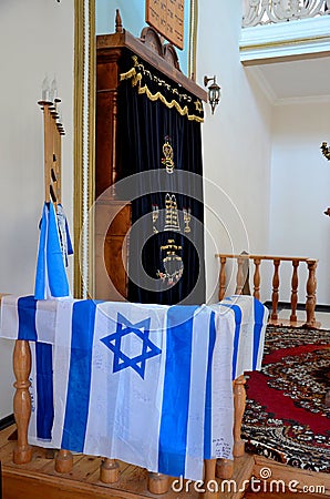 Israel flags menorah and altar inside Jewish synagogue Batumi Georgia Editorial Stock Photo