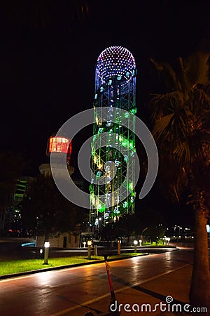 BATUMI, GEORGIA: Night landscape with an Alphabetic Tower and a Lighthouse in the lighting in Batumi. Editorial Stock Photo