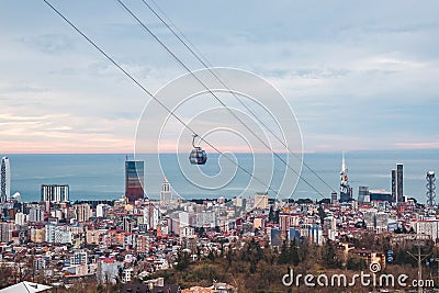 07.01.2024, Batumi, Georgia: two cabins of the cable car in Batumi Georgia against the backdrop of the black sea Editorial Stock Photo