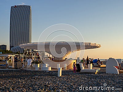 Unusual restaurant by the sea. Place for a snack. Black sea resort. Catering services. At sunset Editorial Stock Photo