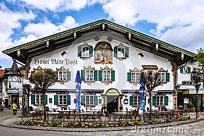 Bavaria, Germany. Painting house in village Oberammergau, Hotel Editorial Stock Photo