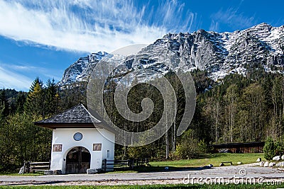 Bavarian Chapel in front of the Alp Mountains Stock Photo